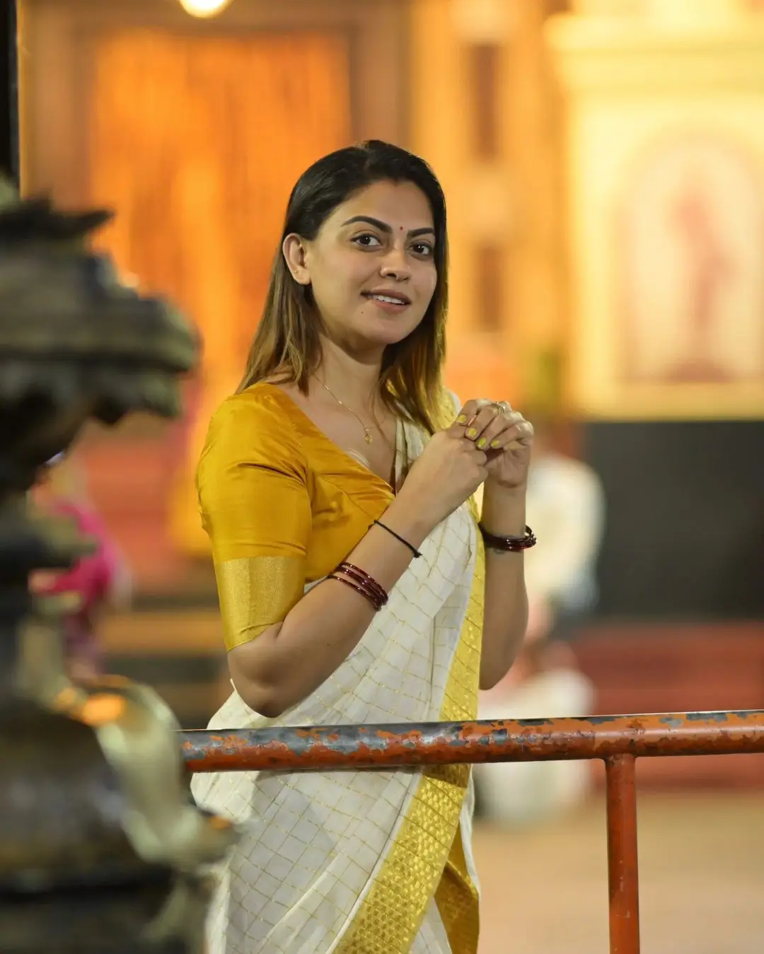 Anusree Nair Wearing Beautiful Earrings Jewellery White Saree Yellow Blouse